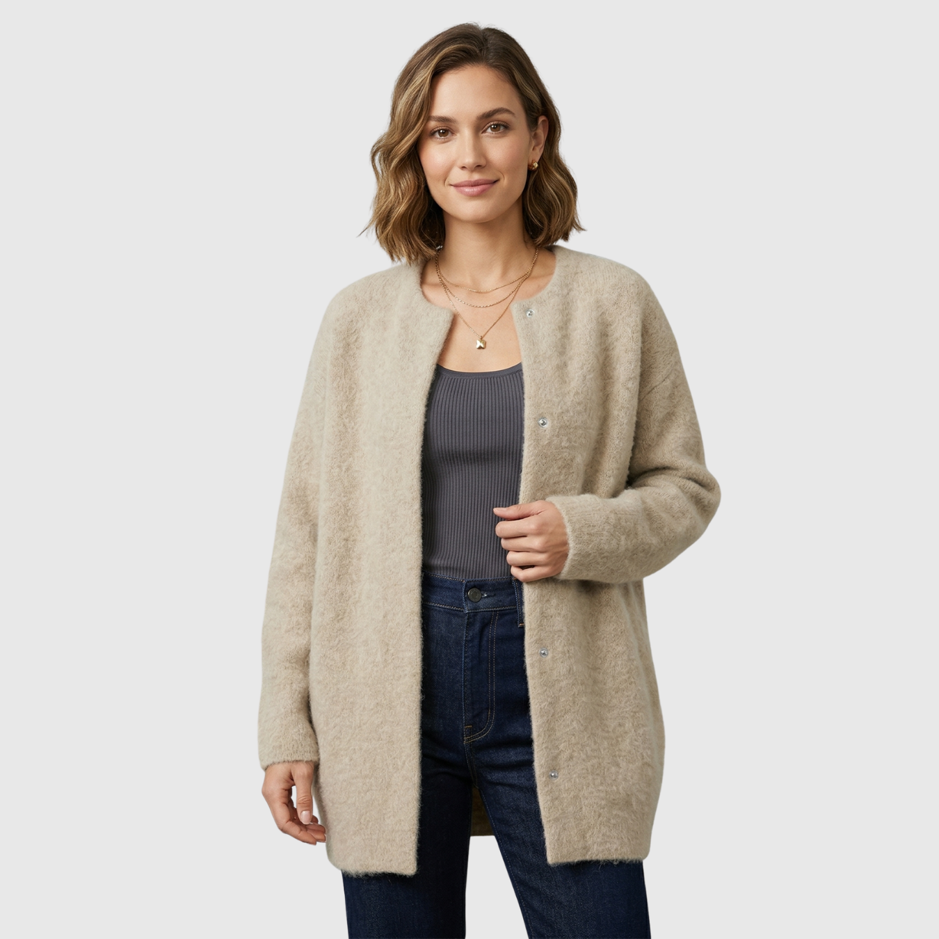 Gilet femme laine coupe ample avec poches et empiècements suédés