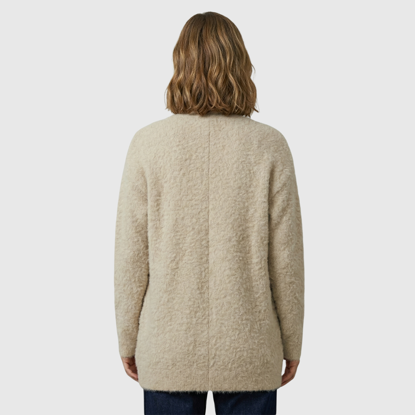Gilet femme laine coupe ample avec poches et empiècements suédés